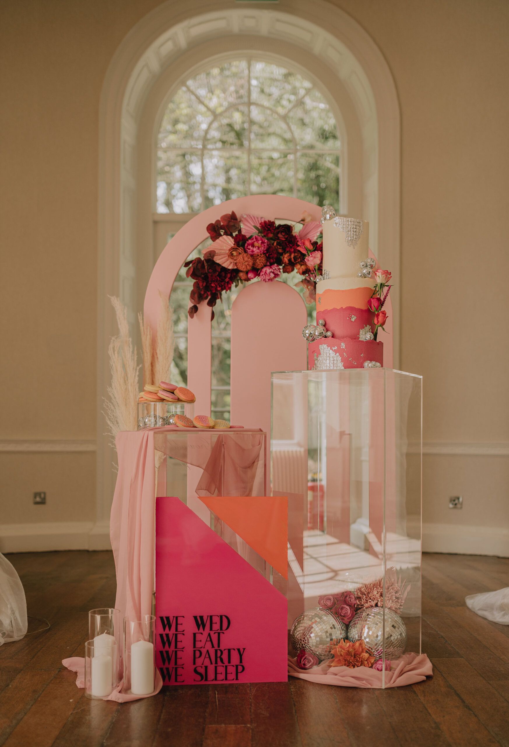 Wedding cake styled with warm autumn florals