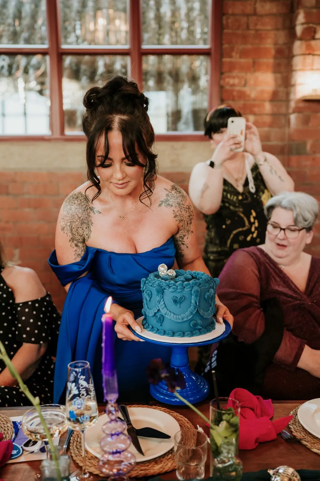 A colourful Lambeth wedding cake shown off during the celebration