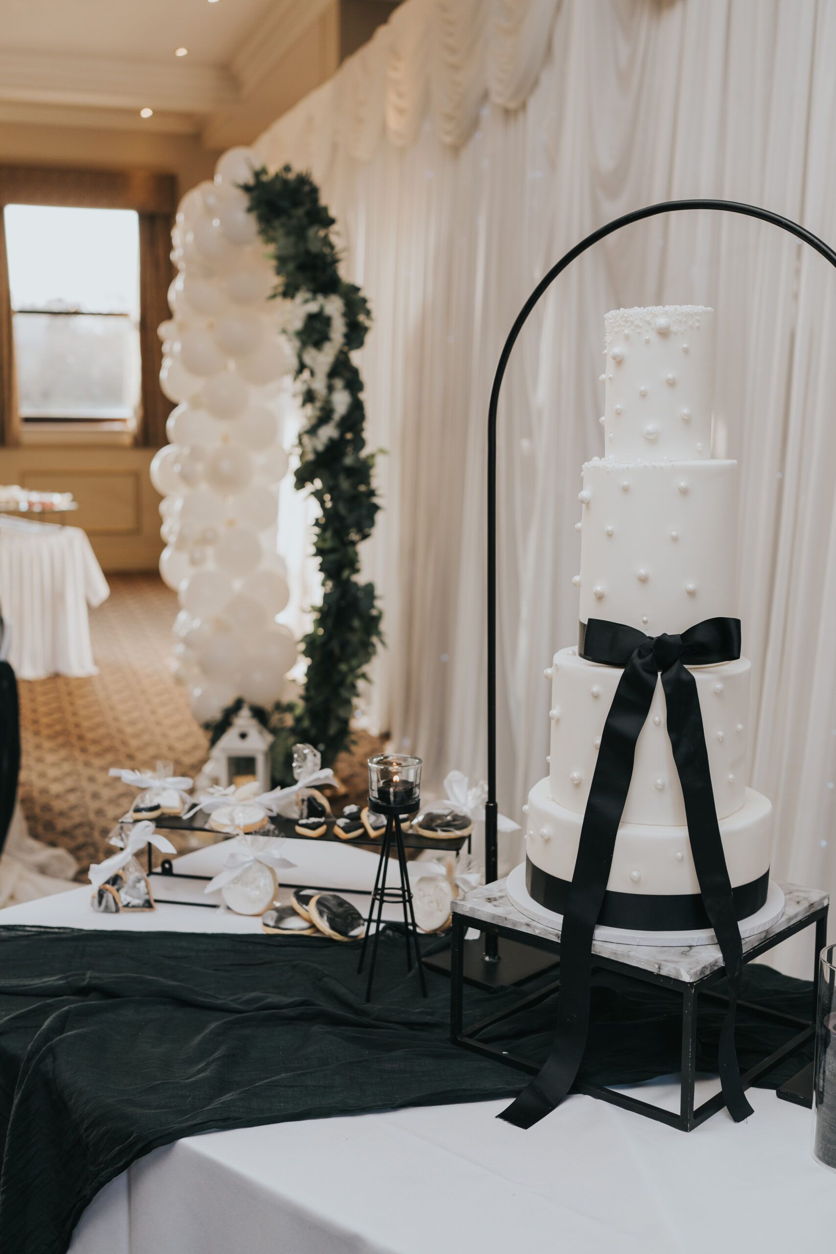 Textured buttercream wedding cake with floral accents