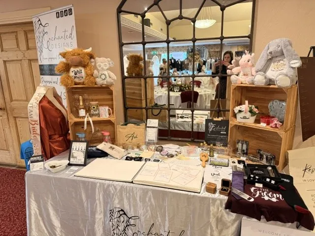 Personalised wedding keepsakes and stationery on the Enchanted Designs table