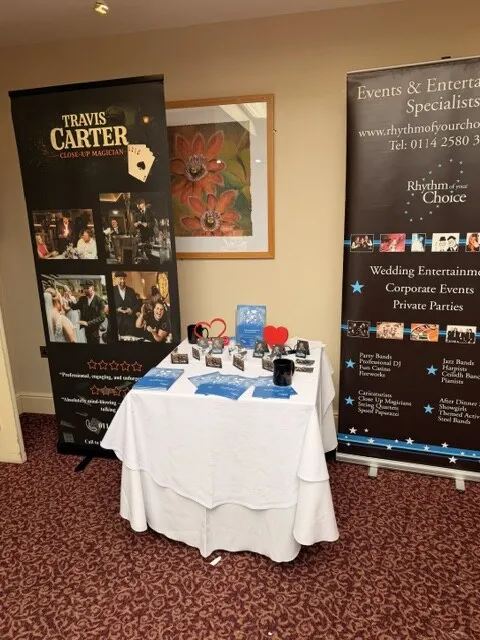 Rhythm of Your Choice wedding entertainment display with event banners