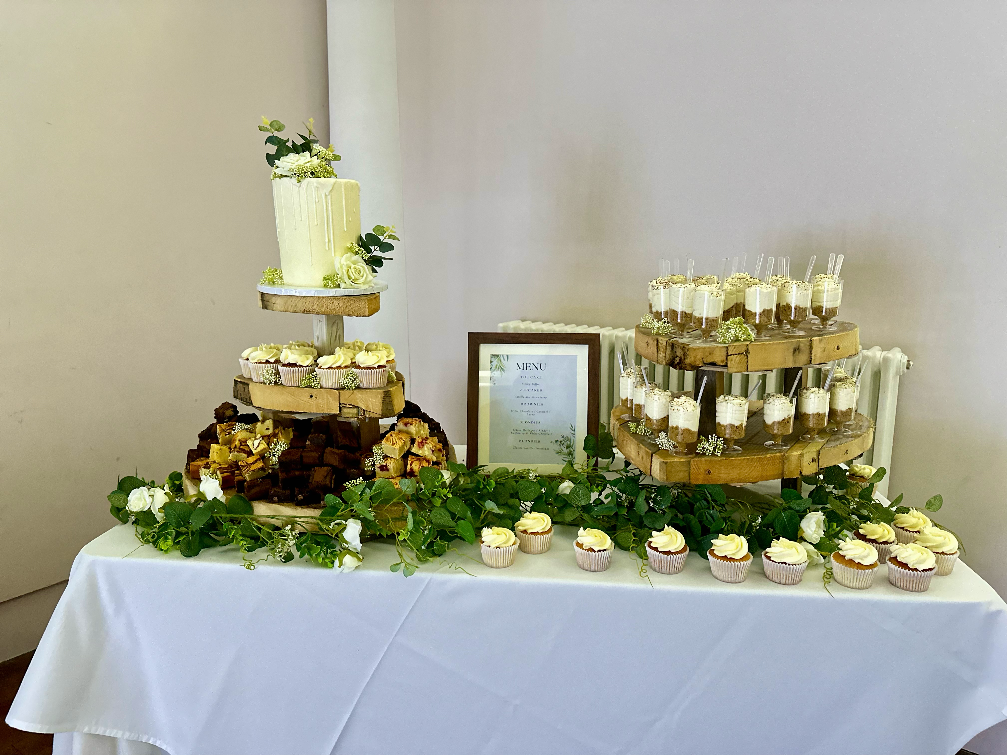 Luxury wedding dessert table spread by Flourish & Flotts